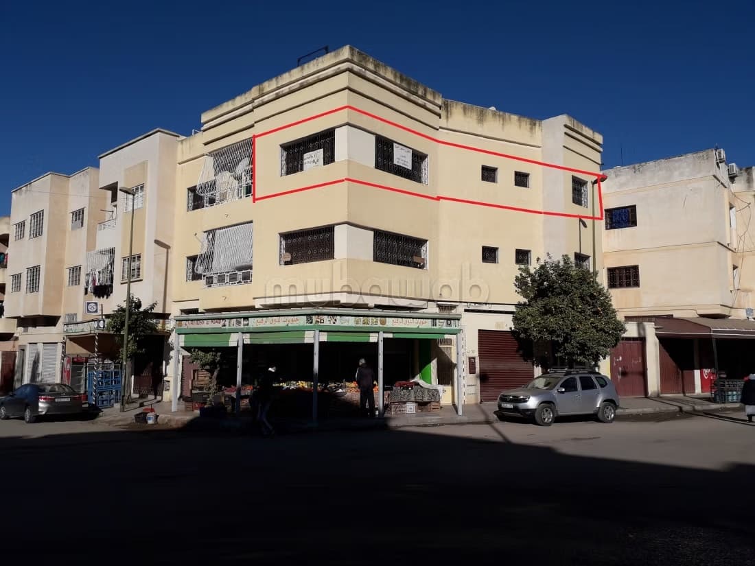 Appartement et commerce a vendre