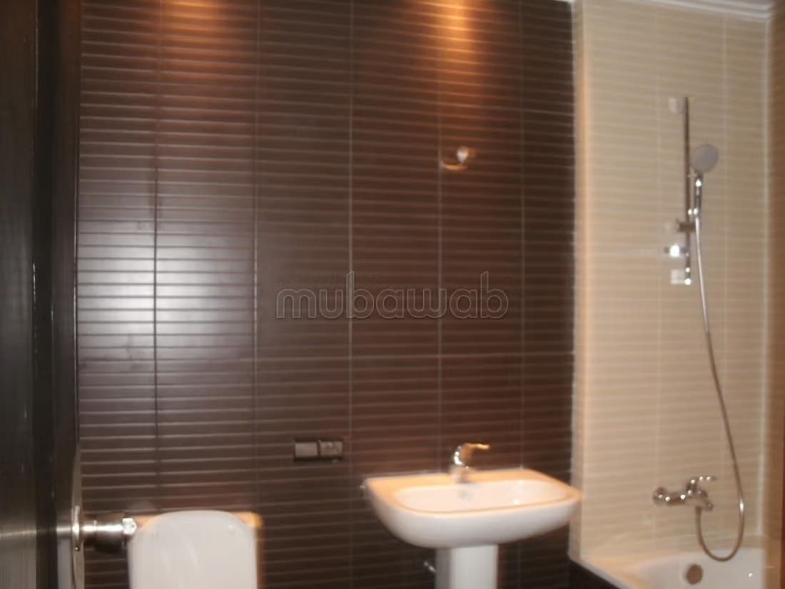 Appartement en location deux chambres salon vide