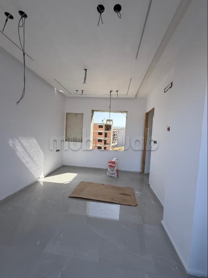 Des appartements et un local commercial à vendre