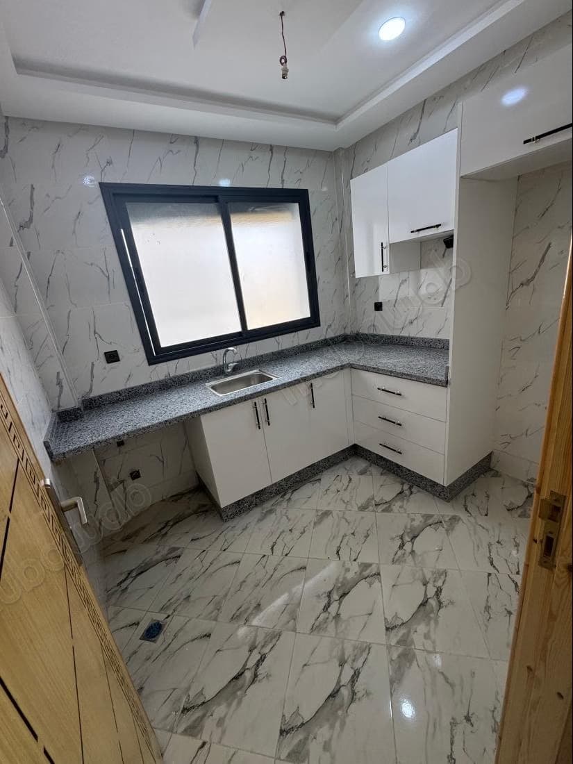 Vente d'un bel appartement à Toulal. 2 chambres. Salon tradi...