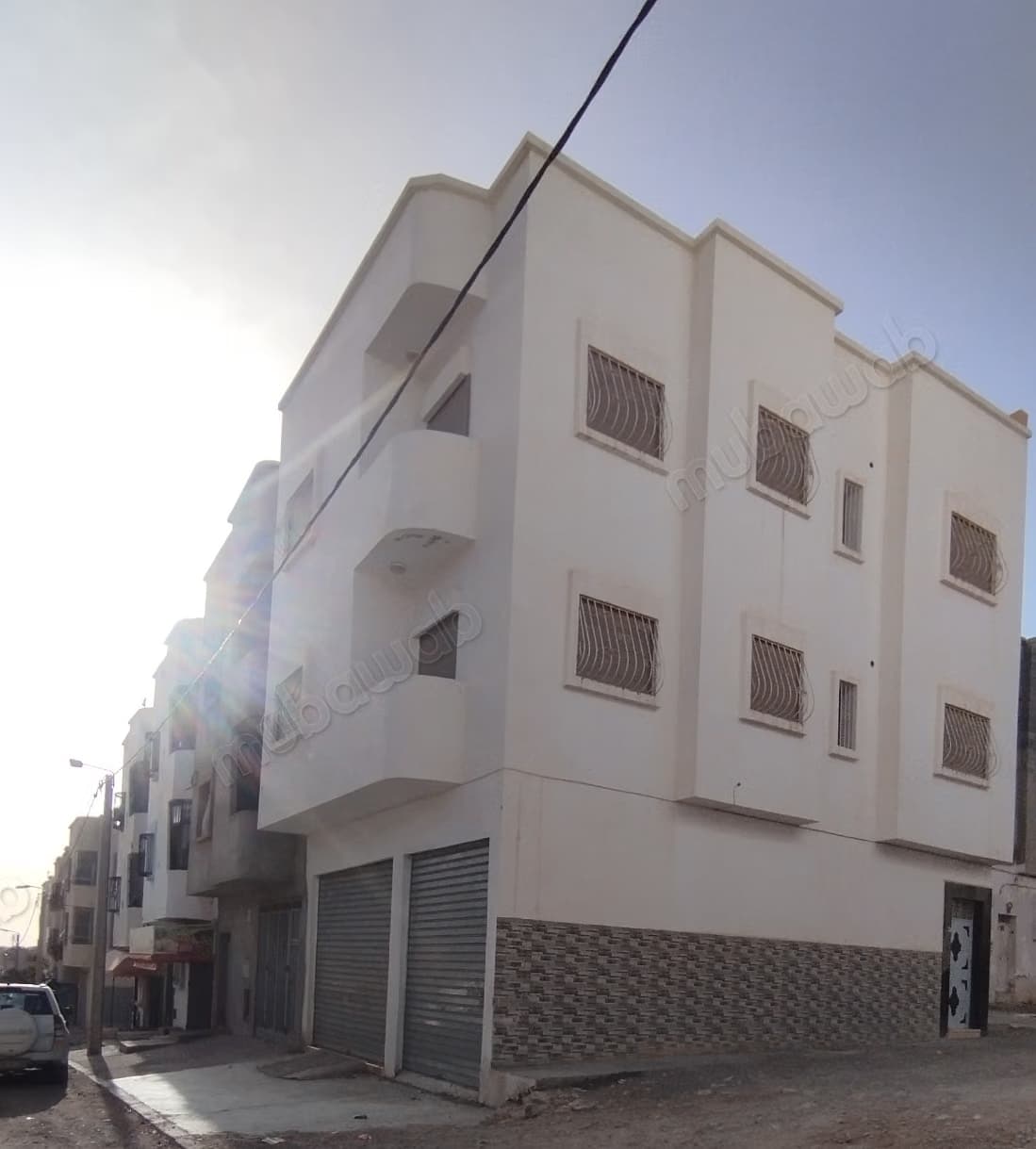 À vendre – maison avec magasin et 2 appartements